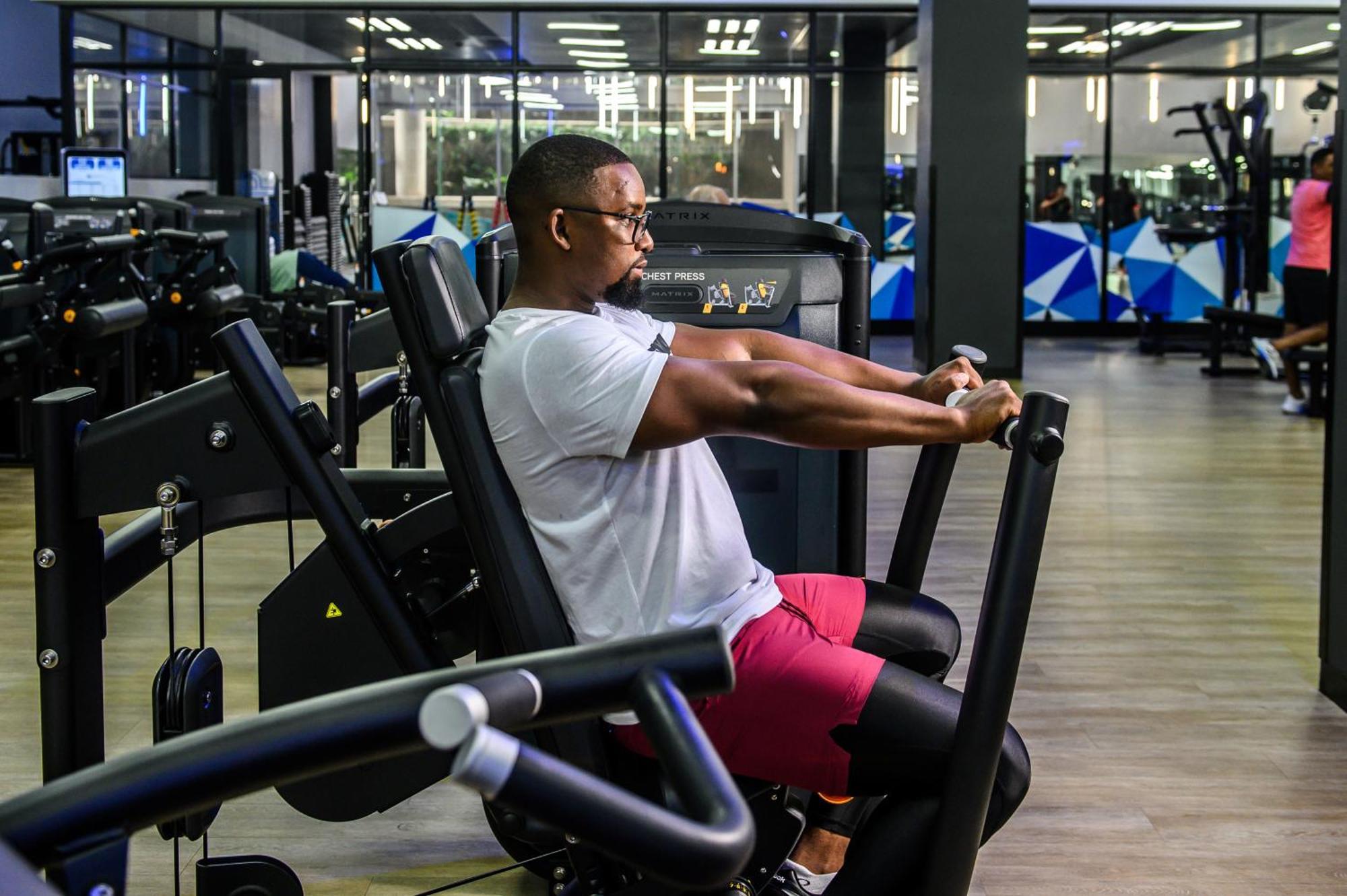 The Capital Pearls Hotel Durban Exterior photo A man using a leg press machine